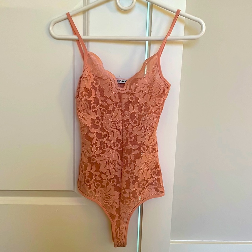 Woman’s body suit.
